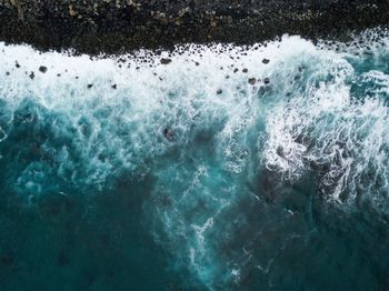 Close-up of water splashing in sea