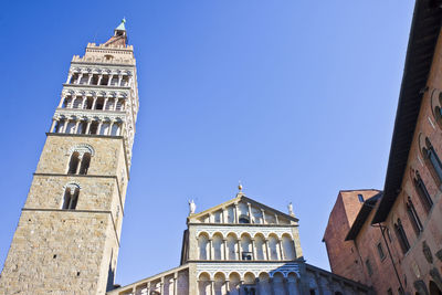 Low angle view of historic building against clear blue sky