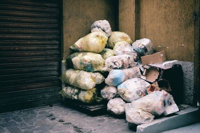 Stack of garbage sacks in corner