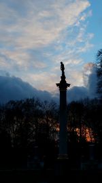 Low angle view of statue against sky