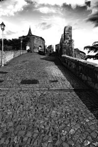 Stone wall against sky