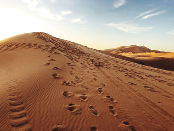 Scenic view of desert against sky