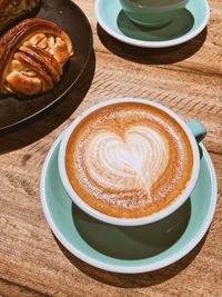 High angle view of cappuccino on table