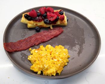 High angle view of breakfast in plate on table