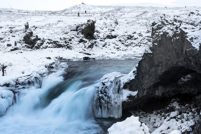 Scenic view of waterfall in winter