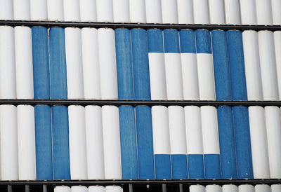 Number ten in blue and white metal panels
