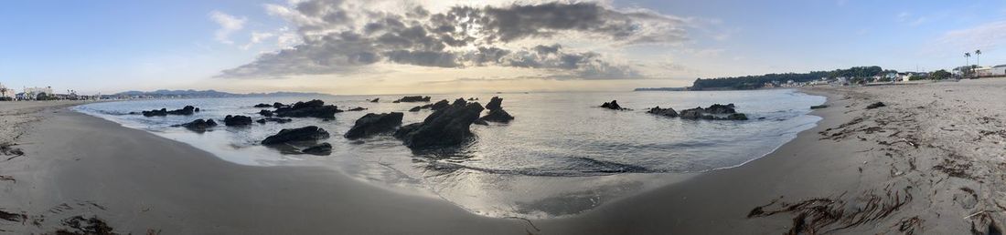 Panoramic view of beach against sky