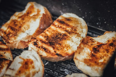 High angle view of bread on barbecue