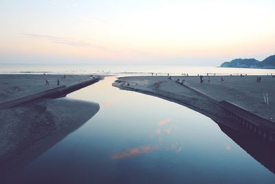 Scenic view of sea at sunset