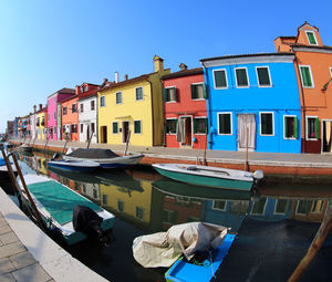 Burano island near venice in italy and the famous painted houses and the navigable waterway
