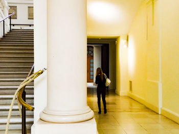 People walking in front of building