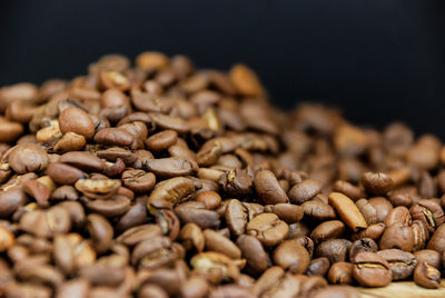 Close-up of coffee beans on table