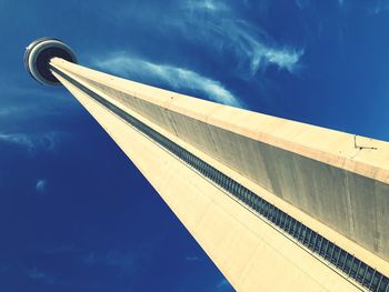 Low angle view of bridge against blue sky