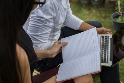 High angle view of people playing book