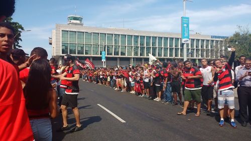 People standing in front of crowd