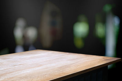 Close-up of empty bench on table