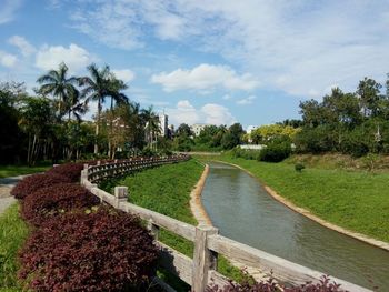 Scenic view of farm against sky