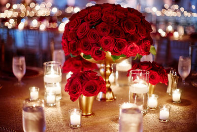 Close-up of red roses on table