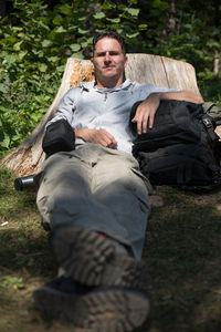 Portrait of man sitting outdoors
