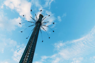 Low angle view of rollercoaster against sky