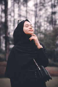 Young woman looking at camera