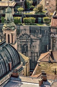 Aerial view of temple amidst buildings in city