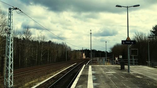 View of railroad station platform against sky