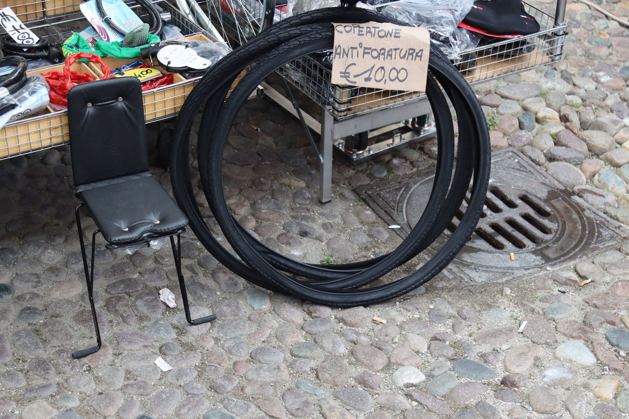 HIGH ANGLE VIEW OF BICYCLE ON SIDEWALK