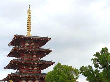 Low angle view of pagoda against sky