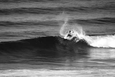 Man surfing in sea