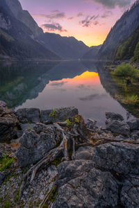 Scenic view of lake against sky during sunset