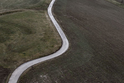 High angle view of empty road amidst landscape