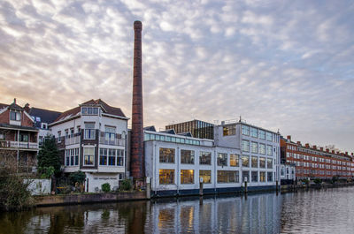 Former factory at the bank of schie canal in delfshaven neighbourhood, now converted to offices