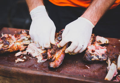 Close-up of man preparing food