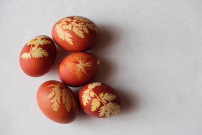 Close-up of eggs on white background