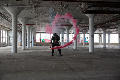 Man with smoke in building