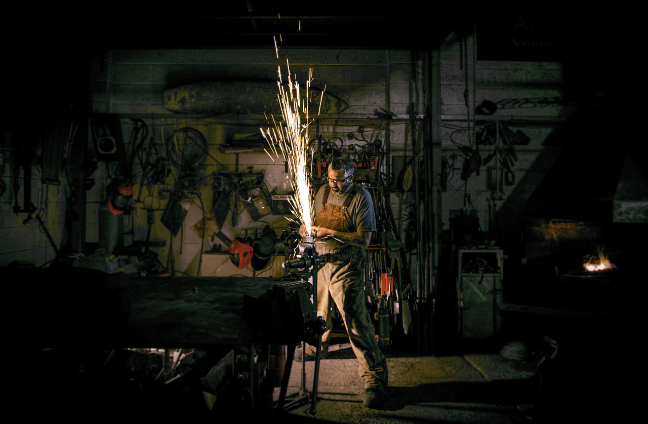 ILLUMINATED LIGHT PAINTING ON BUILDING WALL