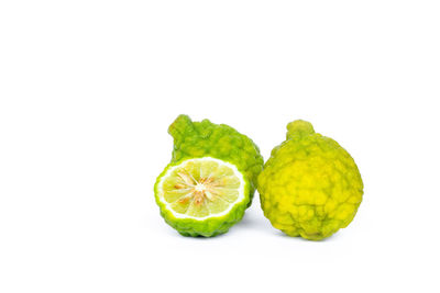 Close-up of fruits against white background