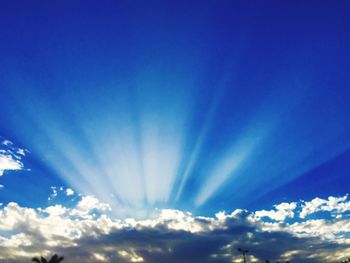 Low angle view of vapor trails in sky