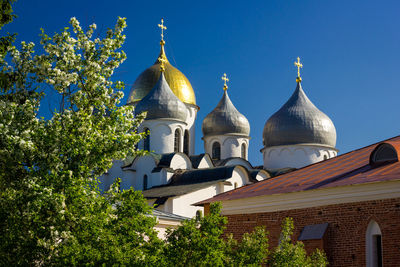Low angle view of traditional building against blue sky