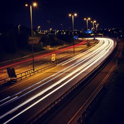 Blurred motion of car moving on road at night