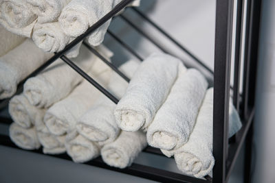Close-up of towels on rack