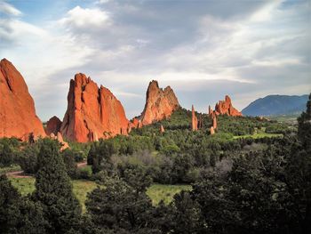 Panoramic view of rocks on landscape against sky