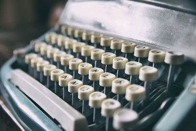 Close-up of typewriter on table