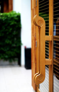 Close-up of door handle on building