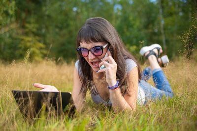 Young woman using mobile phone