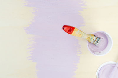 High angle view of paintbrushes on table