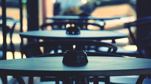Close-up of chairs and table