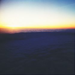 Scenic view of sea at sunset