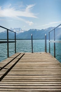 Pier over sea against sky